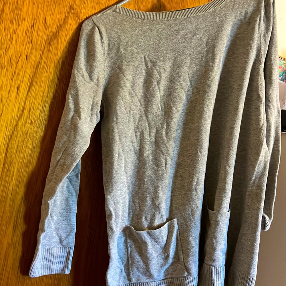Jeanne Pierre Gray crewneck sweater with two front pockets